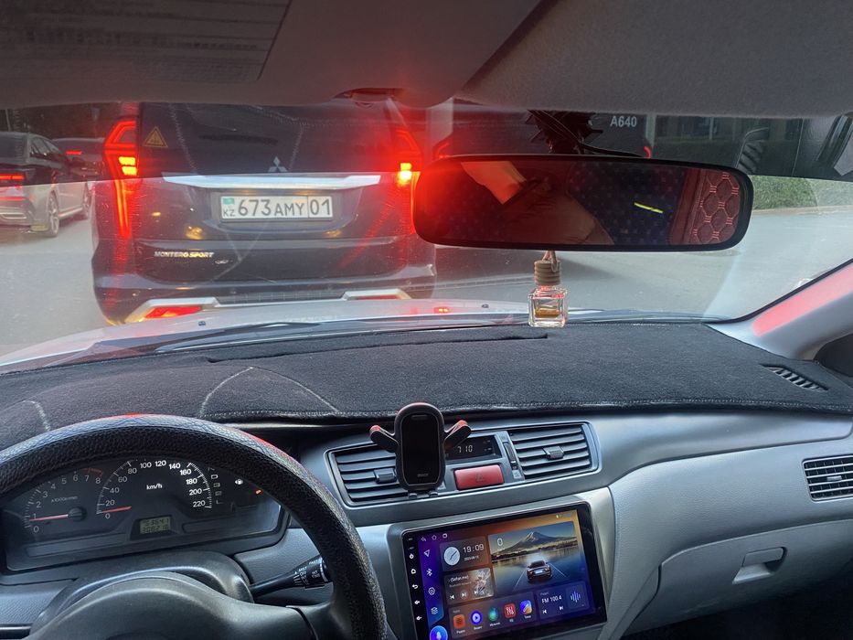 Накидка на панель Lancer 9