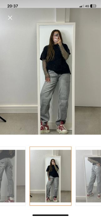 Blugi gri cu model pe spate