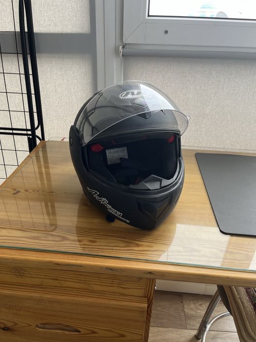 Продам мотошлем новый