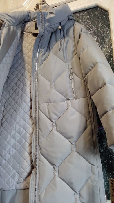 Продам зимний пуховик 48 размер.