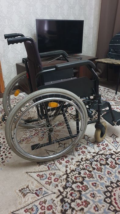 Инвалидная коляска