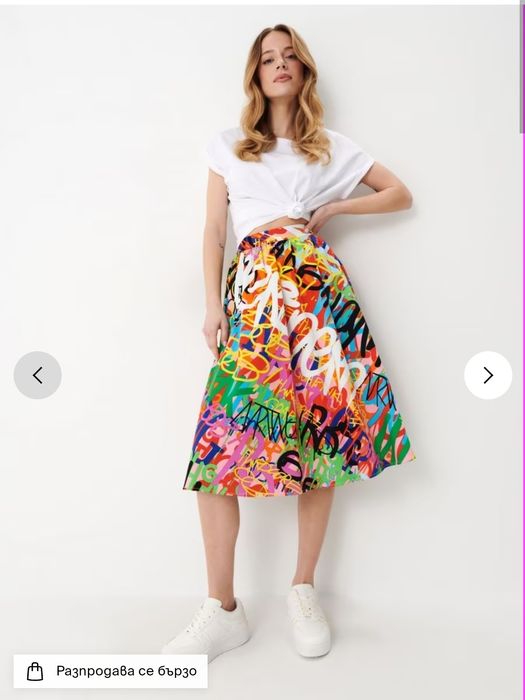 Нови цветни клоширани поли Mohito р-р 40/ 42