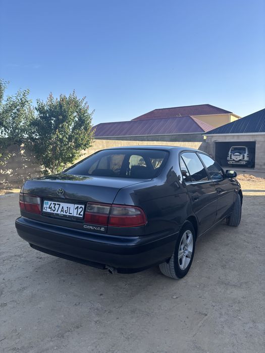 Тойота карина Е