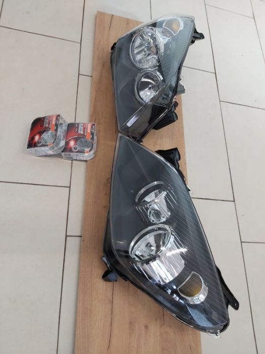 Set Faruri Cu Motor H7/H1 Dr=Stg Opel Astra H 04-07 Cu Bec 100% Putere