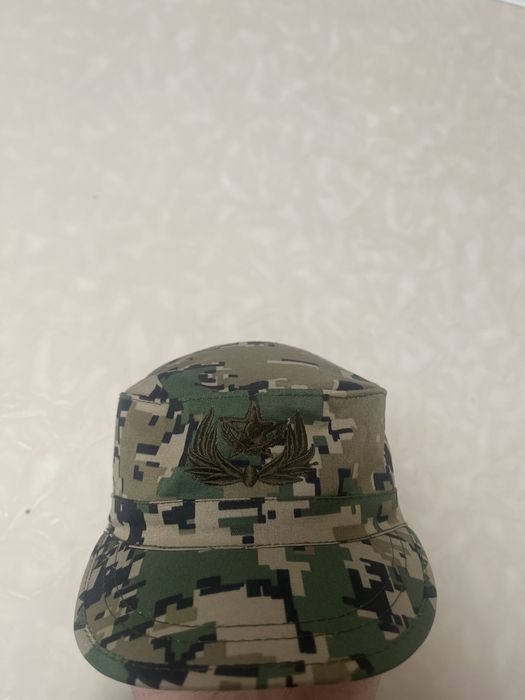 Комуфлированная кепка