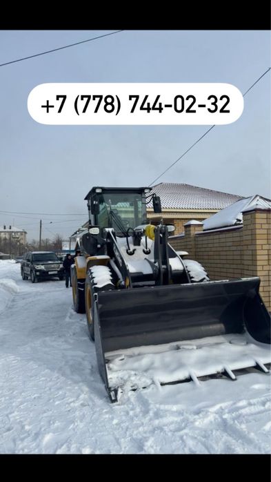 Погрузчик для уборки снега и мусора