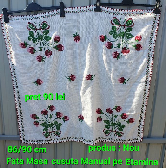 Fata de masa cusuta manual pe etamina