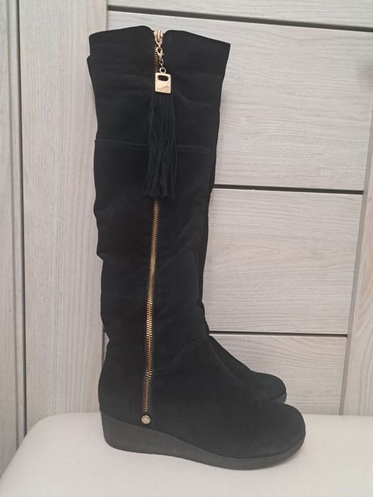 Продам зимние сапоги