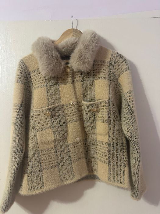 Дамска жилетка от естествен пух