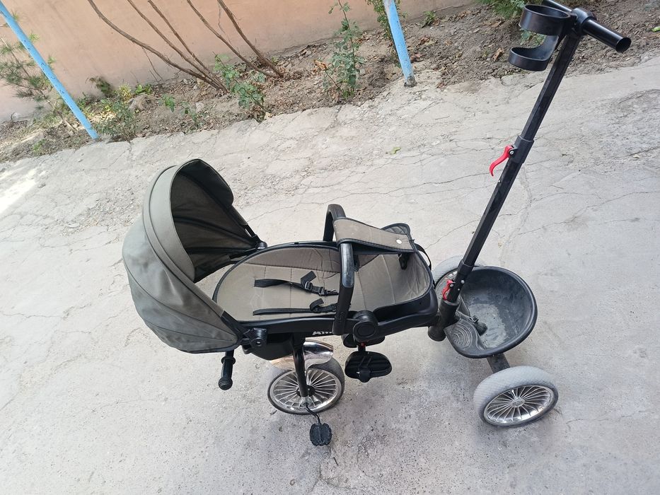 Продается коляска ходунок люлка и велик коляска