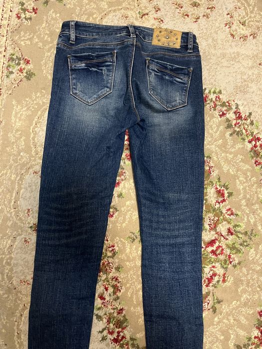 Джинсы женские