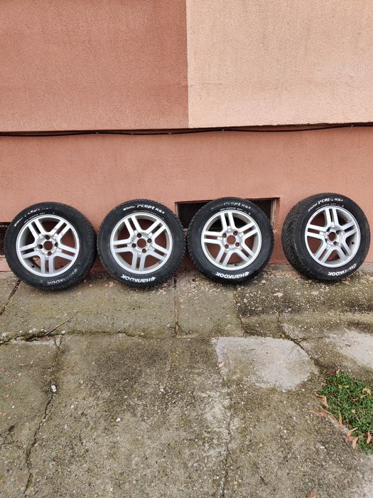 Set roți Ford ,anvelope iarnă+ jante aluminiu R15