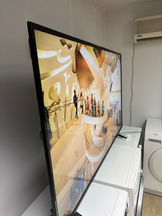 65 инча телевизор Smartbook