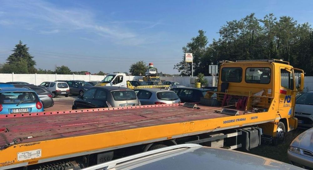 Nissan iveco atleon platforma hidraulica cu furculita si troliu