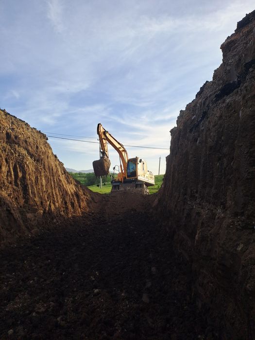 Экскаватор погрузчик хова