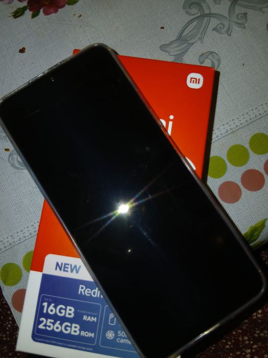 Редми 14с смартфон