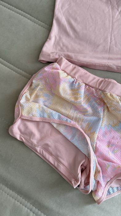 Продам 2 б/у купальника