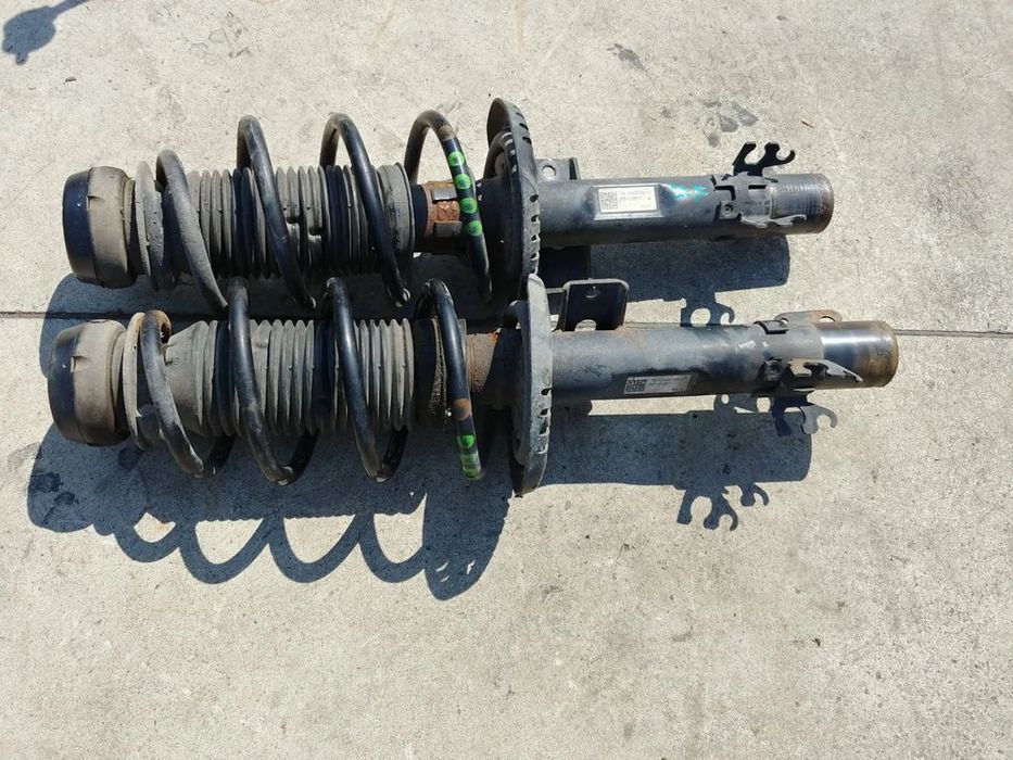 set amortizoare telescoape cu arcuri fata 1.2 tdi seat ibiza 6j 6r0413031f