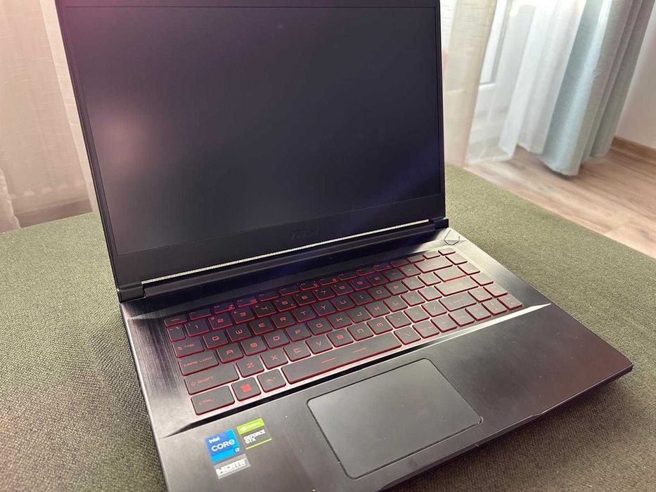 Laptop Gaming MSI GF63 cu procesor Intel i7-11800H 4.60 GHz, 15.6"  144 Hz, 16GB DDR4, 512GB SSD NVIDIA GeForce GTX 1650 4GB
