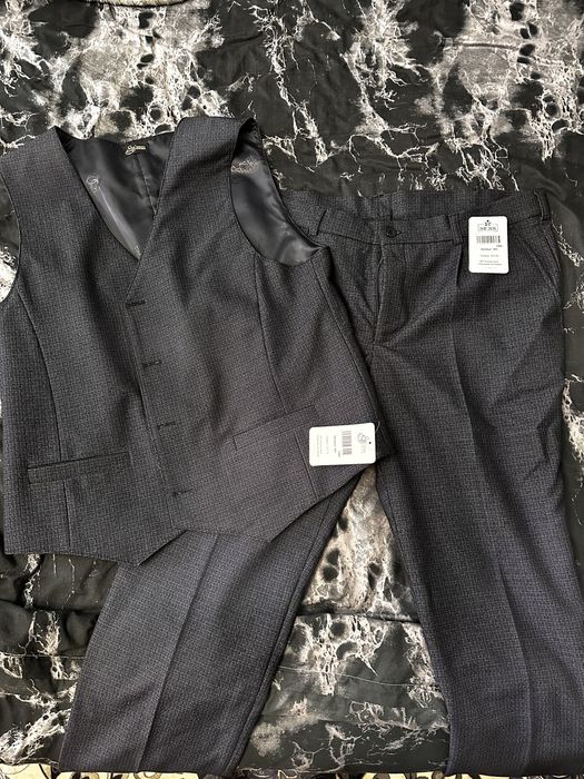 Продам брюки с жилеткой