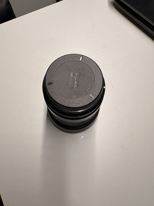 Sigma 30mm 1:1.4 dc dn 52