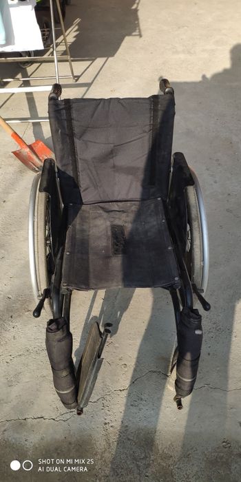 Инвалидная коляска