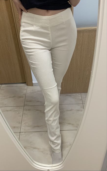 Pantaloni albi mulati