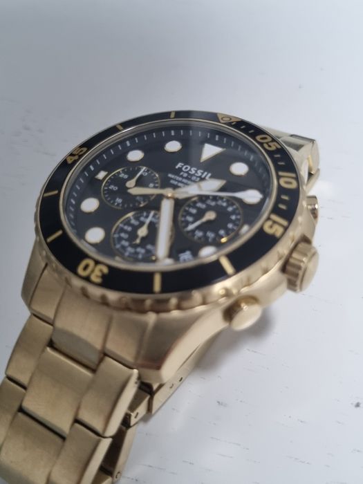 Ceas fossil ca nou