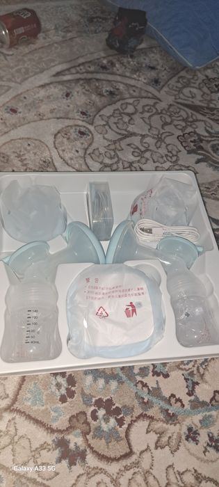 Электронной Молокоотсос