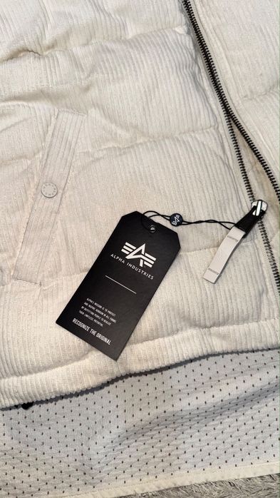 Продам новый и оригинальный пуховик Alpha Industries