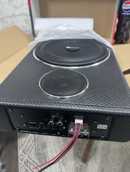 Продам сабвуфер под сиденье новый оригинал