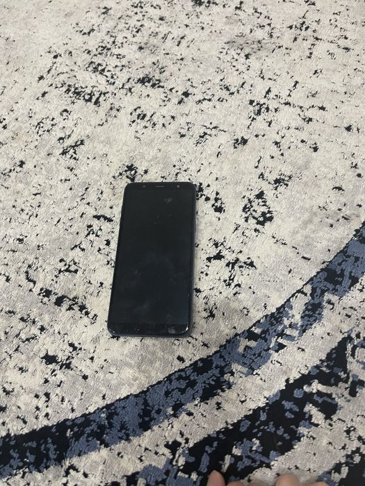 Телефон Самсунг.