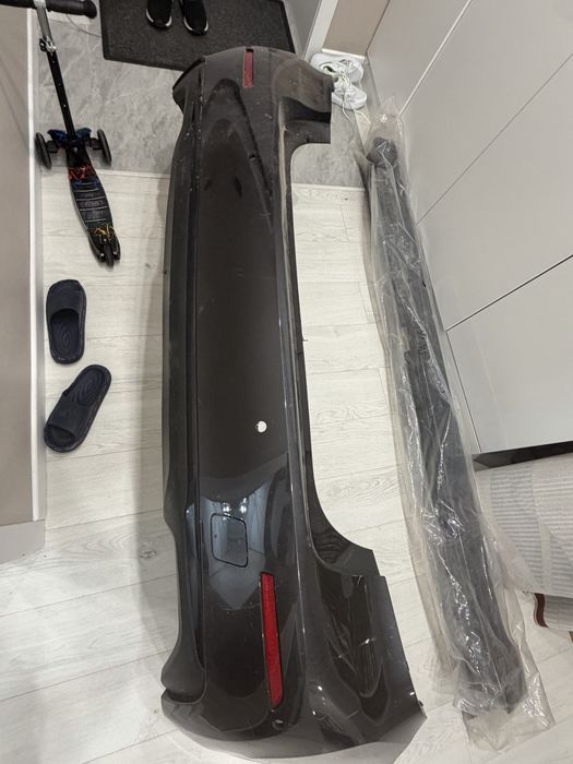 Оригинальный задний бампер BMW G30.