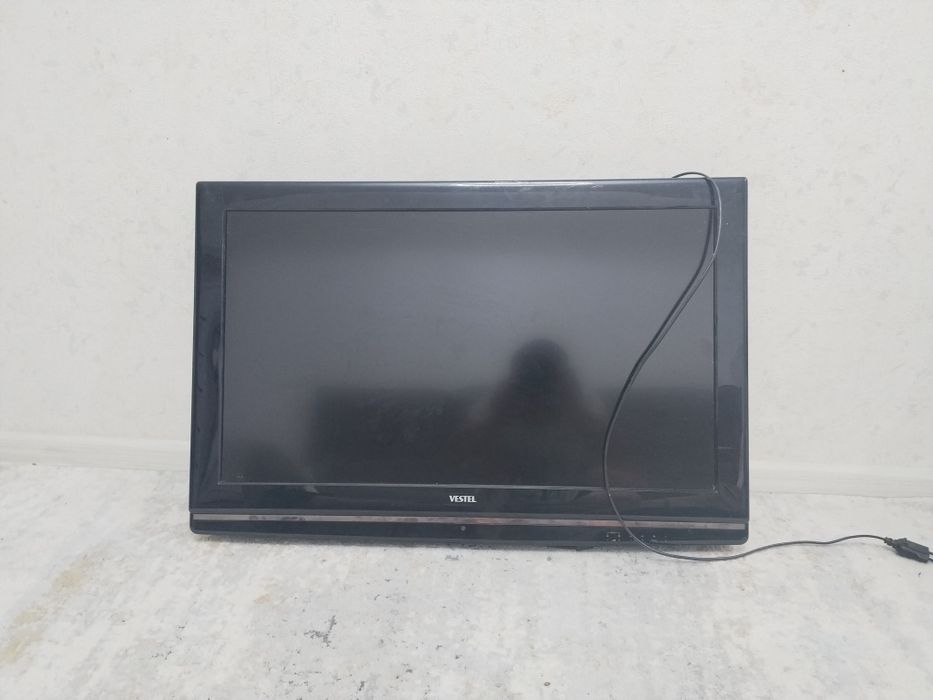 Плазменый Телевизор .