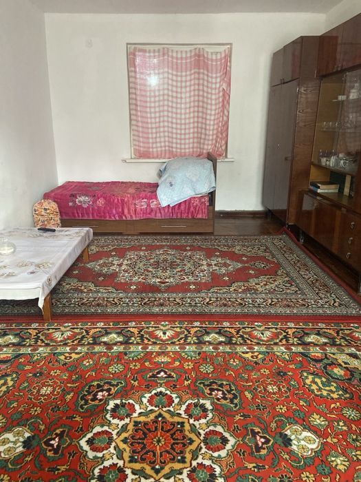 Двухэтажный дом с пристройкой