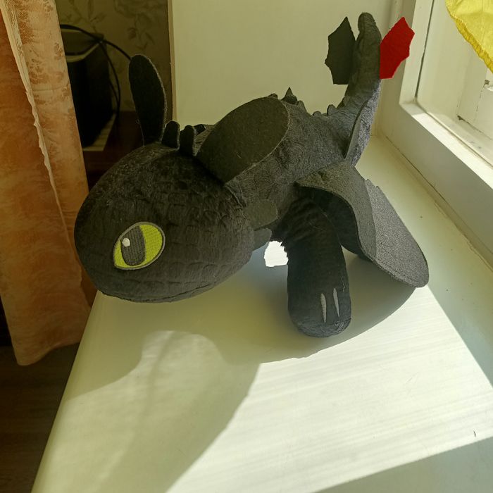 Игрушка в форме дракона