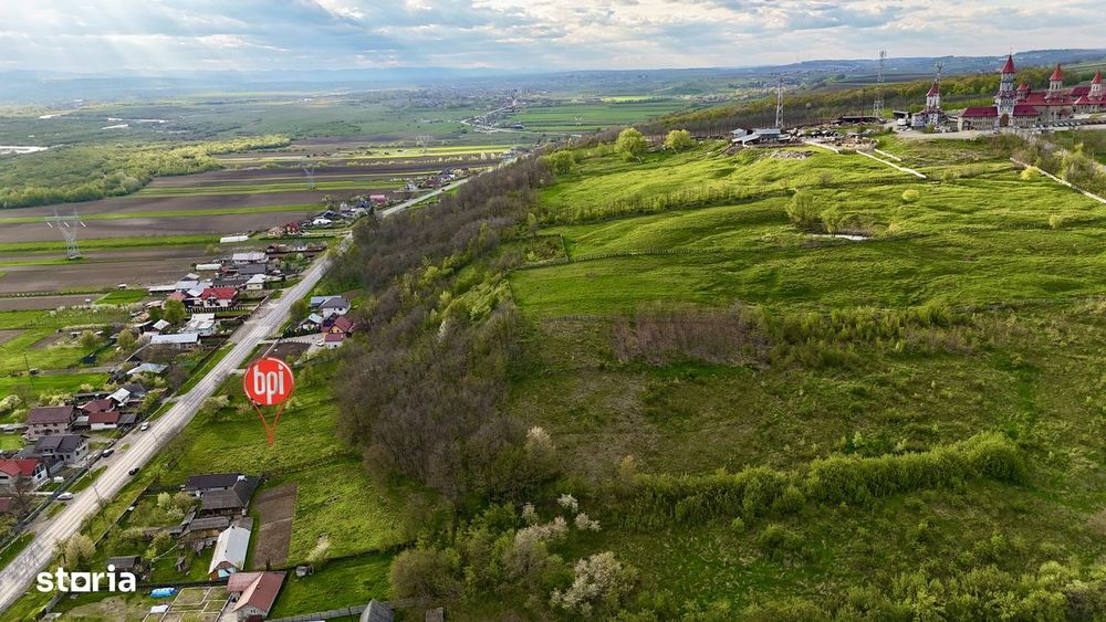 SE VINDE 1ha teren INTRAVILAN cu 25ml front stradal la E85, in Rosiori