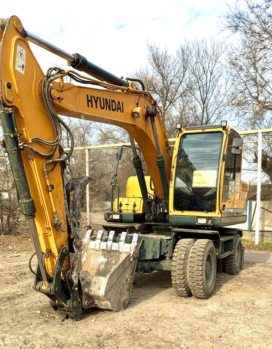 Колесный Экскаватор с Гидромолотом