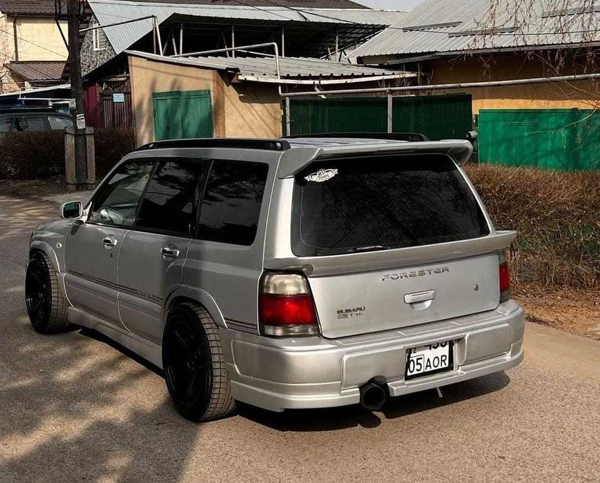 Губа на задний бампер Subaru Forester Sf дорест