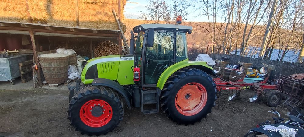 Tractor Claas Ares 577 ATZ + plug