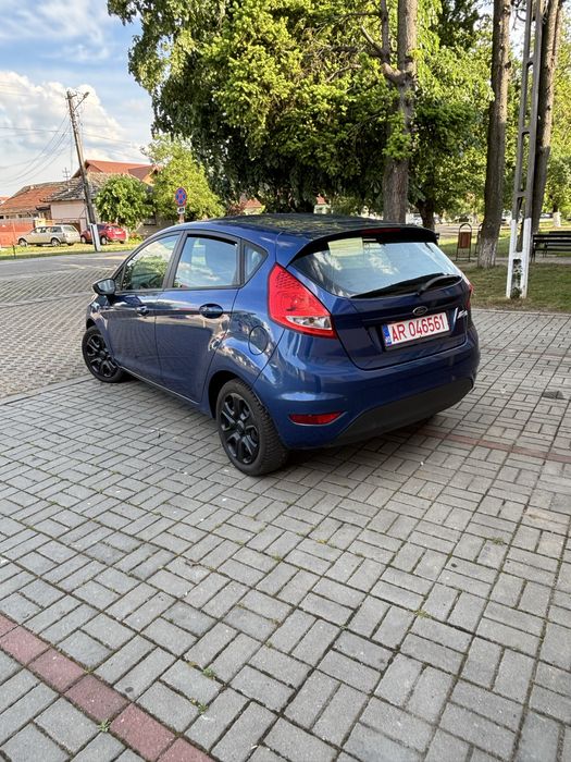 Ford Fiesta Titanium 2010 1.3 benzină, motor clasic fară turbo Euro 5, are numere roșii valabile, ofer fiscal rapid la vânzare.