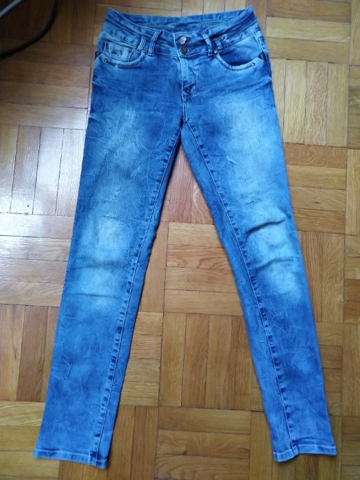 Дамски дънки с кафеви кожени елементи по джобовите