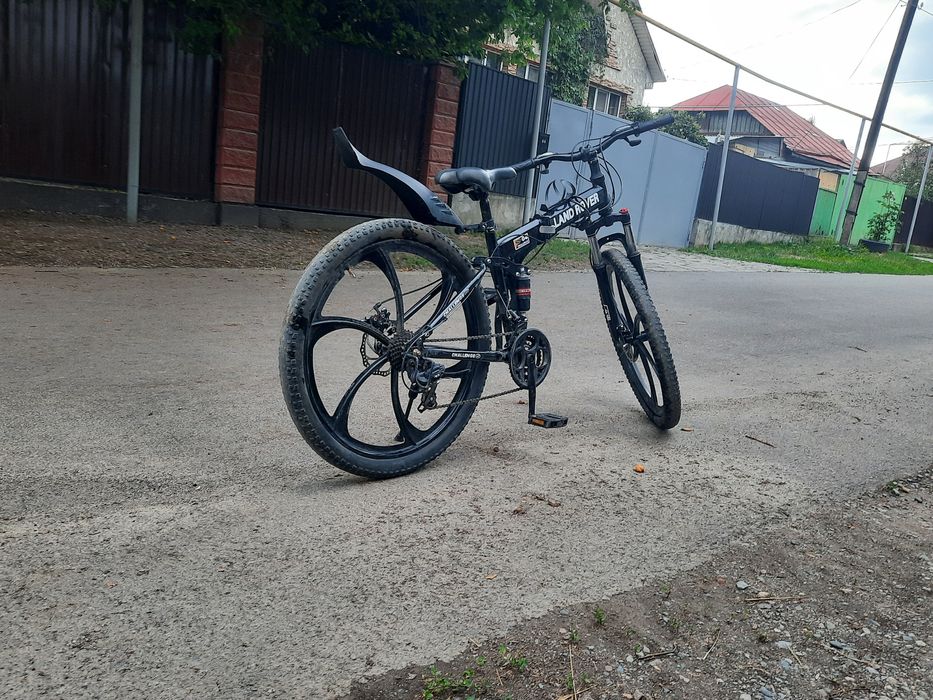 Прадам чёрный велосипед LAND ROVER