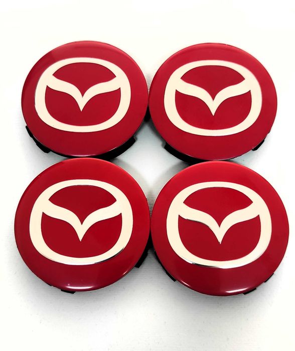 Капачки за Джанти за МАЗДА 56 мм. Цвят: Сребристи, червени и черни.