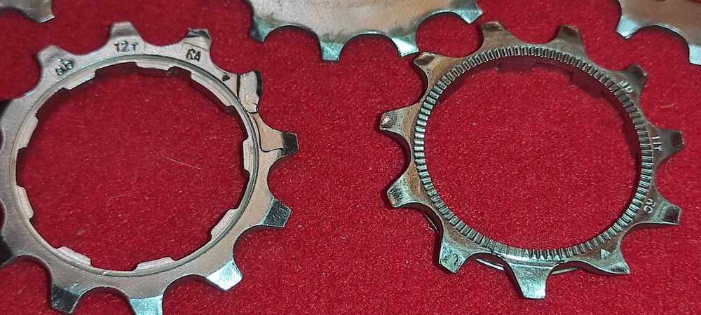 13 bucati pinioane pt. caseta SHIMANO. nu cunosc modelul xtr - xt - dura ace - ultegra - 105 etc