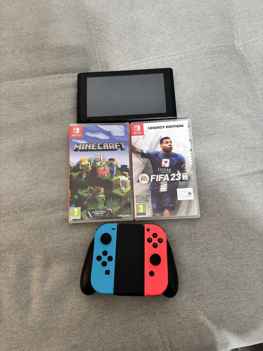 Nintendo SWITCH cu 3 jocuri,volan si husa