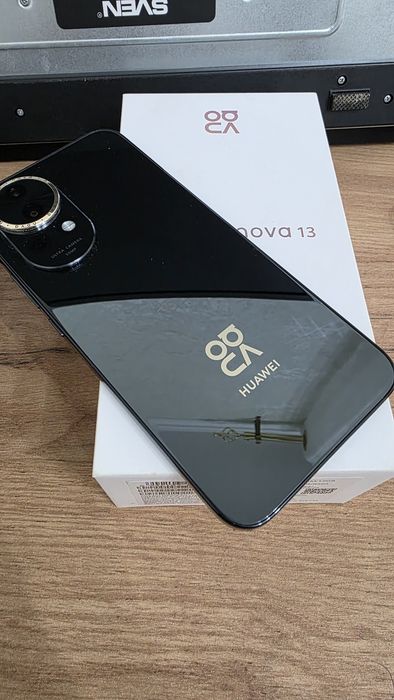 Сматфон с часами марки Huawei