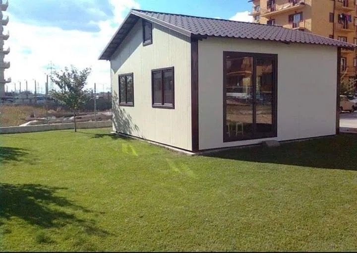 Casa pe structura metalica cu panou sandwich la cheie