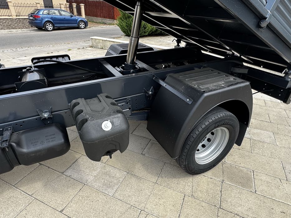 Iveco Daily 65C15 basculabil pe 3 parti  an 2011 de Spania