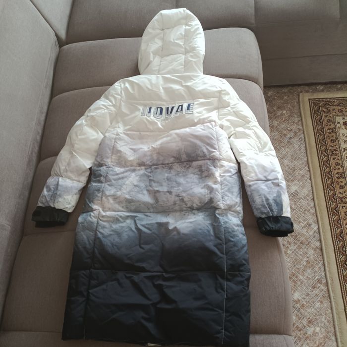 Продаю зимний пуховик